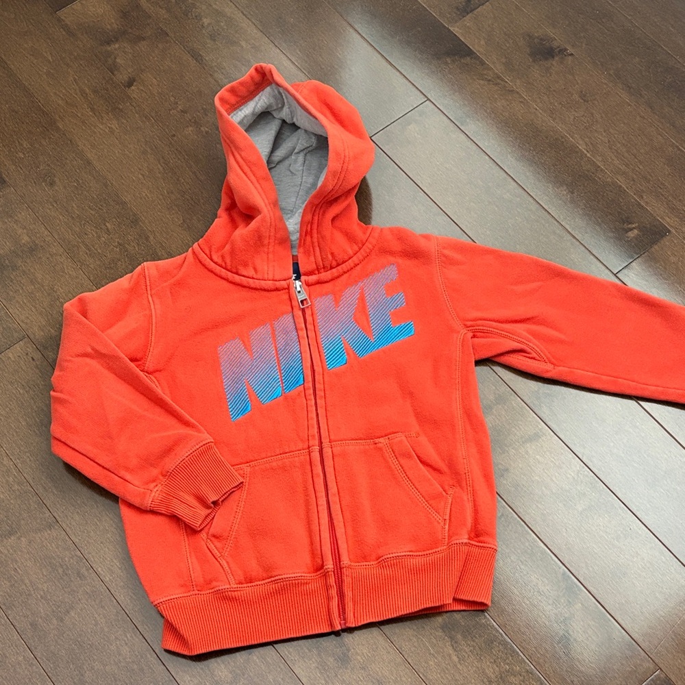 Nike Kids Orange Hoodie with Blue Logo